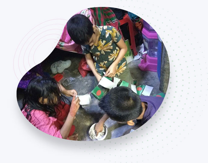 Kids in Mohakhali making Garland with Flags with Abdullah